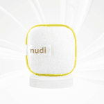 Nudi Pad sitting atop a white podium on a white background